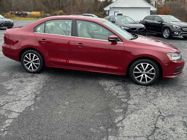 Красный Фольксваген Джетта, объемом двигателя 1.4 л и пробегом 52 тыс. км за 3000 $, фото 5 на Automoto.ua