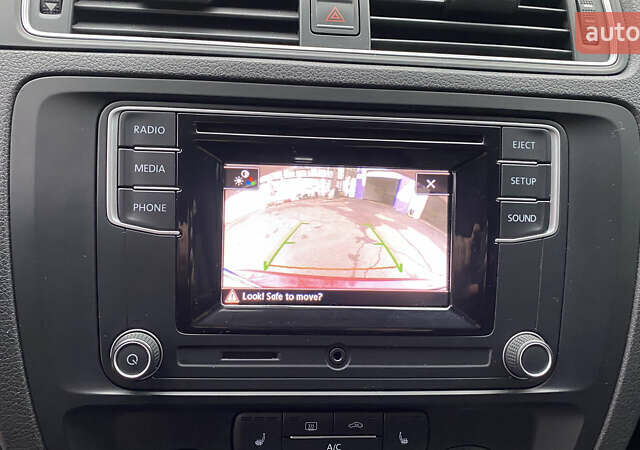 Червоний Фольксваген Джетта, об'ємом двигуна 1.4 л та пробігом 74 тис. км за 11499 $, фото 13 на Automoto.ua