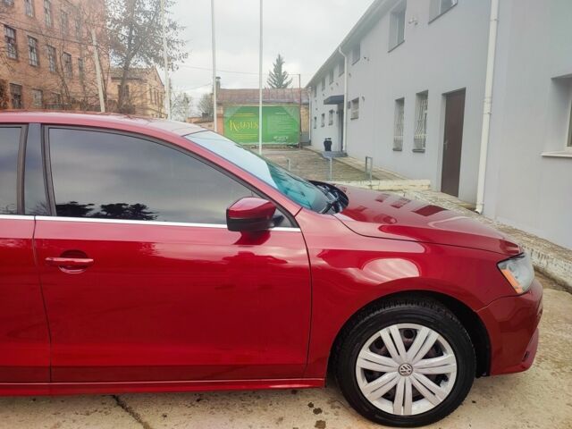 Красный Фольксваген Джетта, объемом двигателя 1.4 л и пробегом 97 тыс. км за 10900 $, фото 6 на Automoto.ua