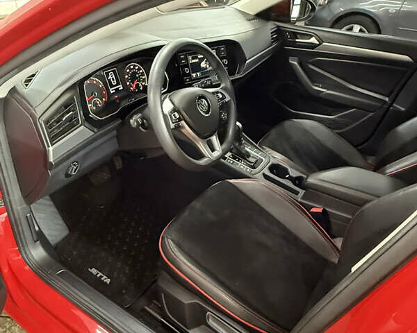 Червоний Фольксваген Джетта, об'ємом двигуна 1.39 л та пробігом 28 тис. км за 14999 $, фото 9 на Automoto.ua