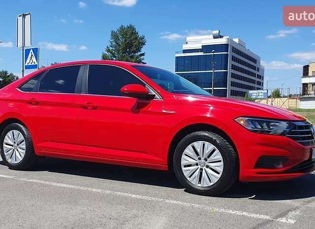 Красный Фольксваген Джетта, объемом двигателя 1.4 л и пробегом 101 тыс. км за 15599 $, фото 1 на Automoto.ua