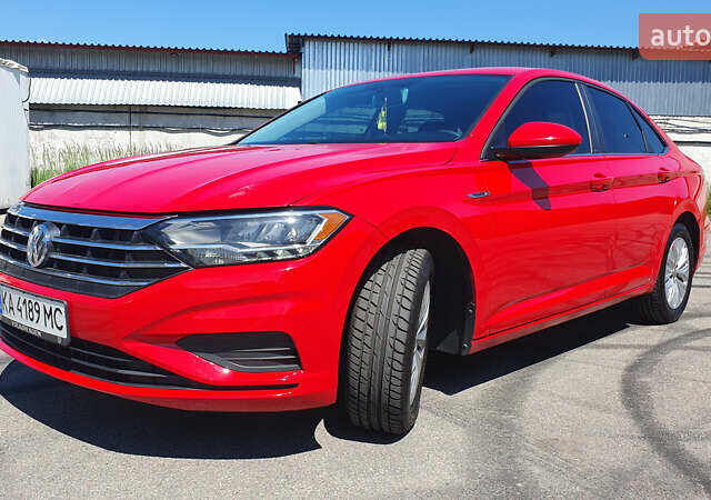 Красный Фольксваген Джетта, объемом двигателя 1.4 л и пробегом 101 тыс. км за 15599 $, фото 2 на Automoto.ua