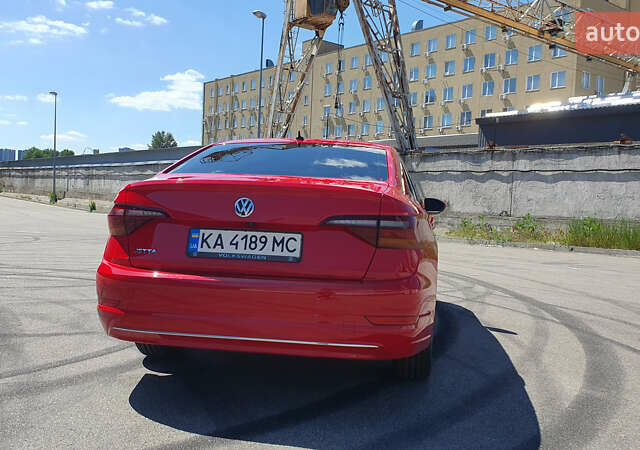 Красный Фольксваген Джетта, объемом двигателя 1.4 л и пробегом 101 тыс. км за 15599 $, фото 8 на Automoto.ua