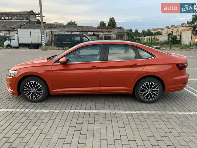 Красный Фольксваген Джетта, объемом двигателя 1.4 л и пробегом 31 тыс. км за 15700 $, фото 3 на Automoto.ua