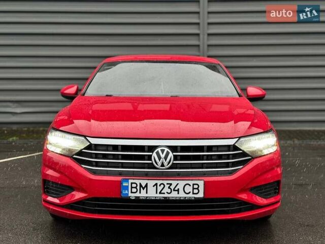Красный Фольксваген Джетта, объемом двигателя 1.4 л и пробегом 84 тыс. км за 14000 $, фото 5 на Automoto.ua