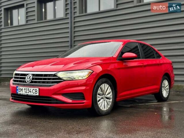Красный Фольксваген Джетта, объемом двигателя 1.4 л и пробегом 84 тыс. км за 14000 $, фото 2 на Automoto.ua