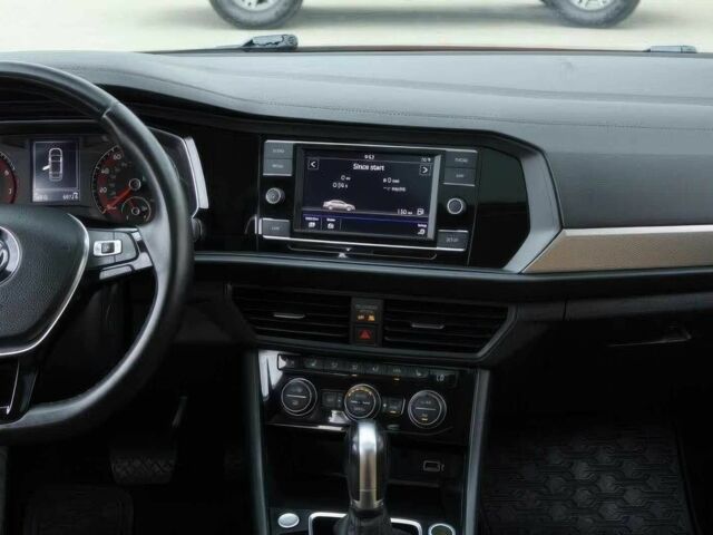 Червоний Фольксваген Джетта, об'ємом двигуна 1.4 л та пробігом 47 тис. км за 7800 $, фото 9 на Automoto.ua