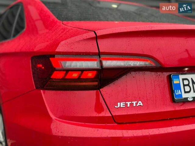 Красный Фольксваген Джетта, объемом двигателя 1.4 л и пробегом 84 тыс. км за 14000 $, фото 21 на Automoto.ua