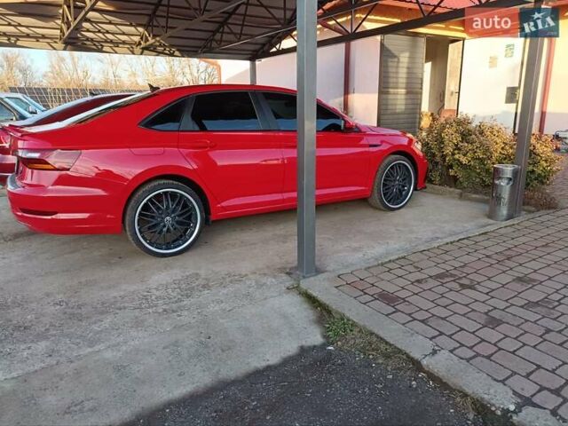 Червоний Фольксваген Джетта, об'ємом двигуна 1.4 л та пробігом 157 тис. км за 16000 $, фото 7 на Automoto.ua
