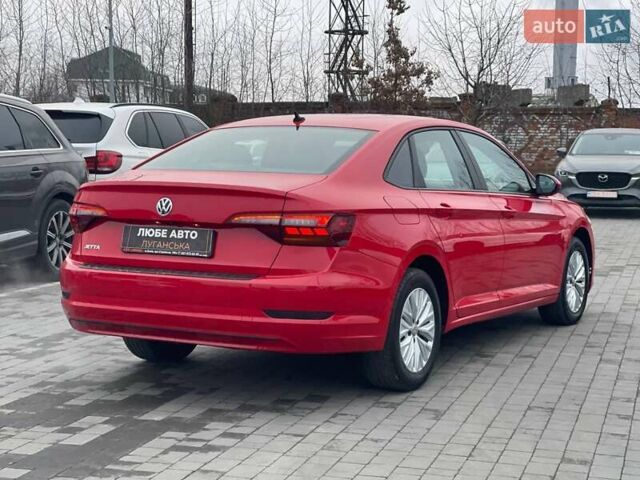 Красный Фольксваген Джетта, объемом двигателя 1.4 л и пробегом 84 тыс. км за 14500 $, фото 5 на Automoto.ua