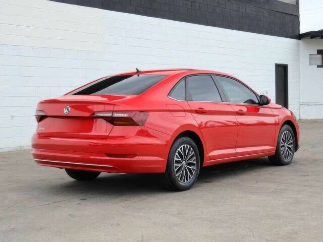 Червоний Фольксваген Джетта, об'ємом двигуна 1.4 л та пробігом 47 тис. км за 7800 $, фото 4 на Automoto.ua