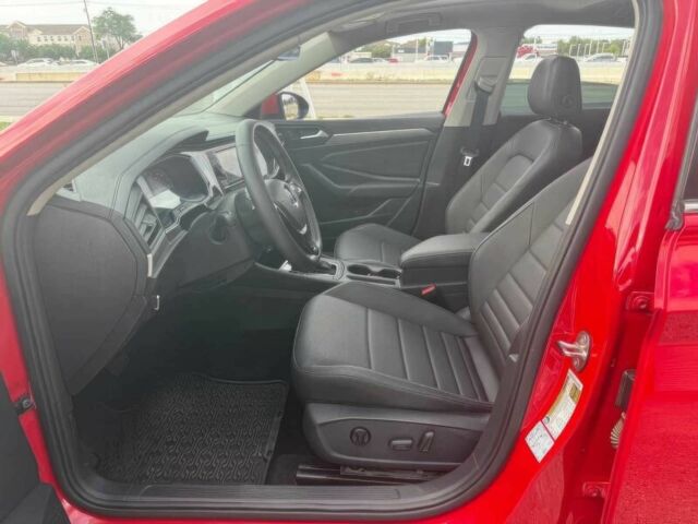 Красный Фольксваген Джетта, объемом двигателя 1.4 л и пробегом 24 тыс. км за 11700 $, фото 8 на Automoto.ua