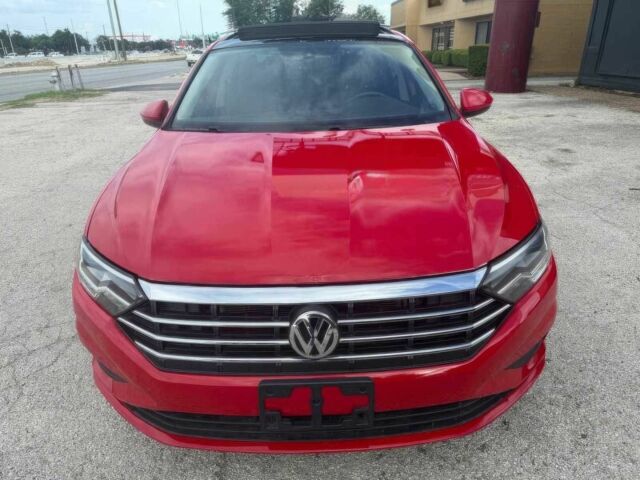 Красный Фольксваген Джетта, объемом двигателя 1.4 л и пробегом 24 тыс. км за 11700 $, фото 1 на Automoto.ua