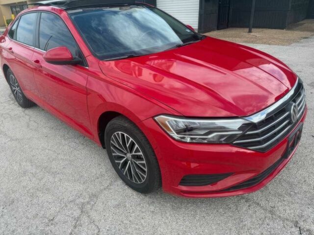 Красный Фольксваген Джетта, объемом двигателя 1.4 л и пробегом 24 тыс. км за 11700 $, фото 2 на Automoto.ua