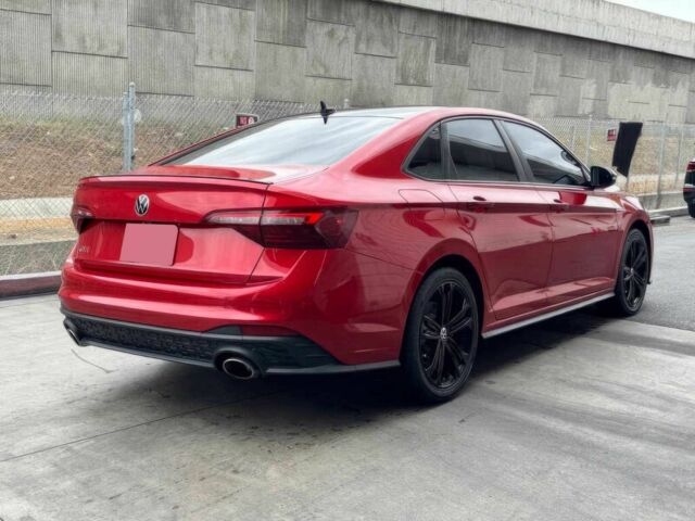 Червоний Фольксваген Джетта, об'ємом двигуна 2 л та пробігом 14 тис. км за 12000 $, фото 5 на Automoto.ua