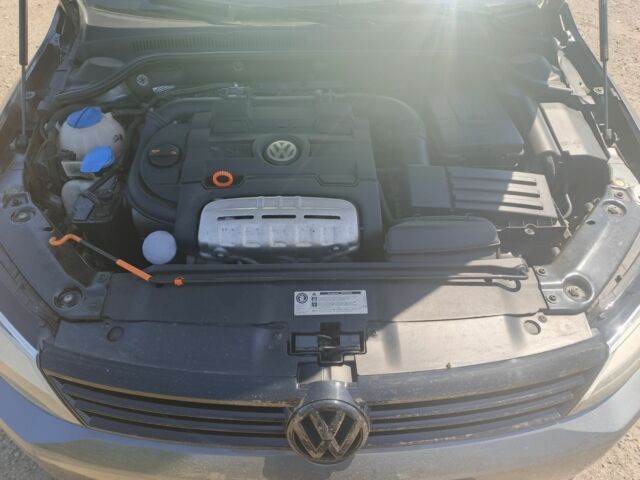 Серый Фольксваген Джетта, объемом двигателя 1.4 л и пробегом 84 тыс. км за 11500 $, фото 6 на Automoto.ua