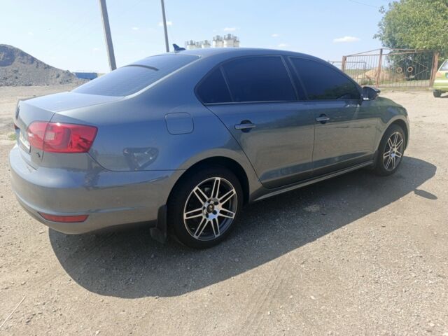 Серый Фольксваген Джетта, объемом двигателя 1.4 л и пробегом 84 тыс. км за 11500 $, фото 3 на Automoto.ua