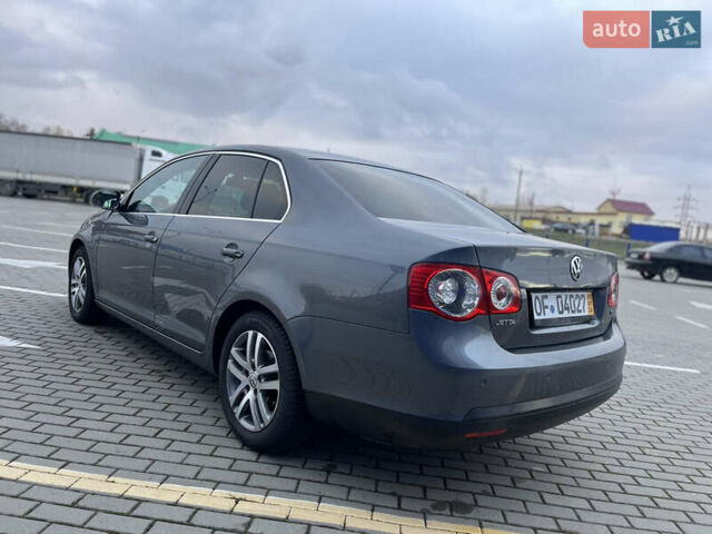 Серый Фольксваген Джетта, объемом двигателя 1.4 л и пробегом 253 тыс. км за 6500 $, фото 8 на Automoto.ua