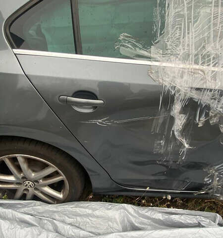 Серый Фольксваген Джетта, объемом двигателя 1.39 л и пробегом 230 тыс. км за 6500 $, фото 7 на Automoto.ua