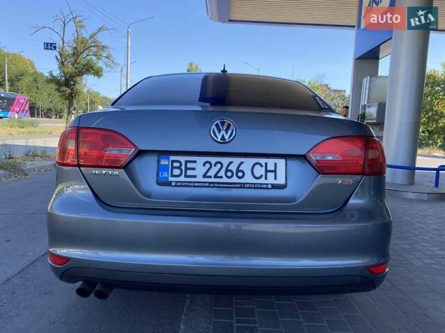 Сірий Фольксваген Джетта, об'ємом двигуна 1.39 л та пробігом 327 тис. км за 7600 $, фото 5 на Automoto.ua