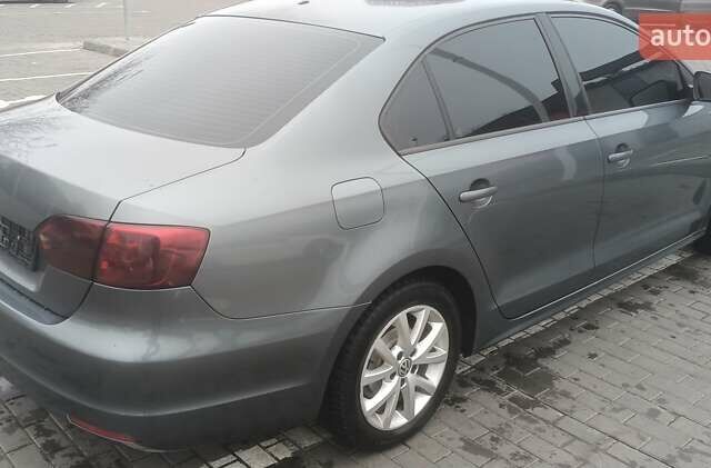 Сірий Фольксваген Джетта, об'ємом двигуна 1.97 л та пробігом 160 тис. км за 10000 $, фото 4 на Automoto.ua