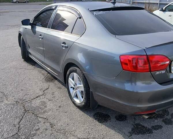 Серый Фольксваген Джетта, объемом двигателя 2 л и пробегом 260 тыс. км за 7500 $, фото 3 на Automoto.ua