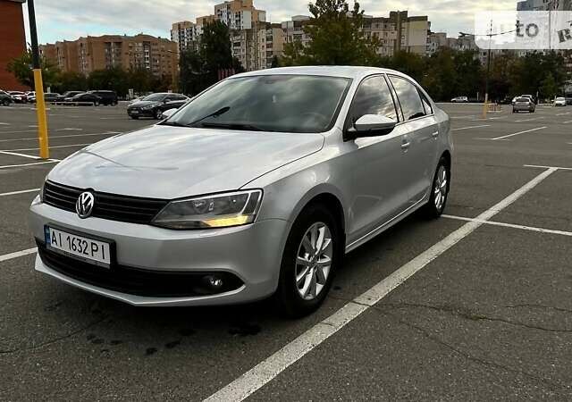 Сірий Фольксваген Джетта, об'ємом двигуна 1.4 л та пробігом 212 тис. км за 9300 $, фото 2 на Automoto.ua