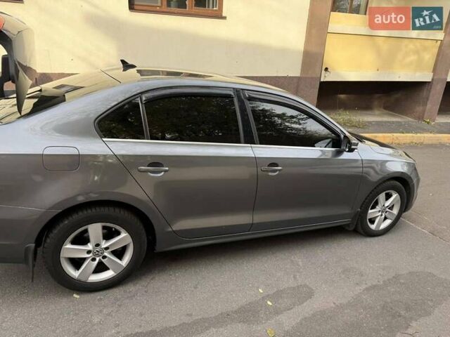 Серый Фольксваген Джетта, объемом двигателя 1.97 л и пробегом 145 тыс. км за 12000 $, фото 2 на Automoto.ua