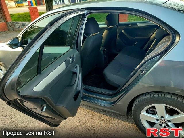 Серый Фольксваген Джетта, объемом двигателя 1.4 л и пробегом 168 тыс. км за 8400 $, фото 2 на Automoto.ua