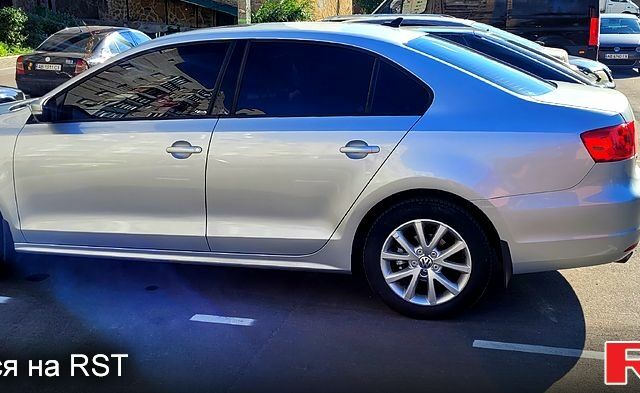 Серый Фольксваген Джетта, объемом двигателя 2.5 л и пробегом 210 тыс. км за 7700 $, фото 1 на Automoto.ua