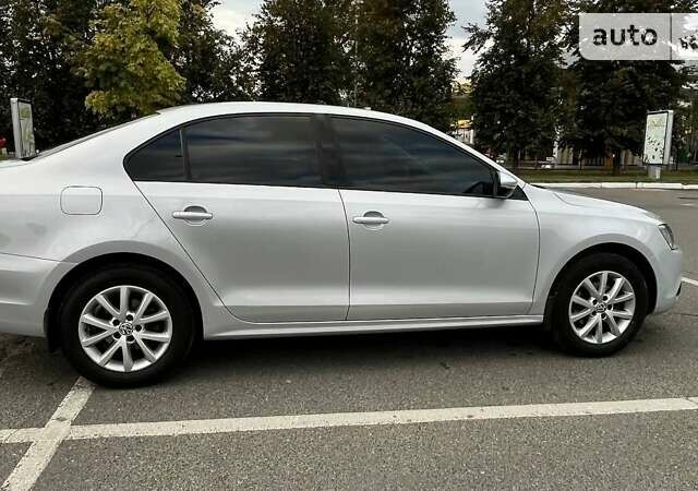 Сірий Фольксваген Джетта, об'ємом двигуна 1.4 л та пробігом 212 тис. км за 9300 $, фото 3 на Automoto.ua