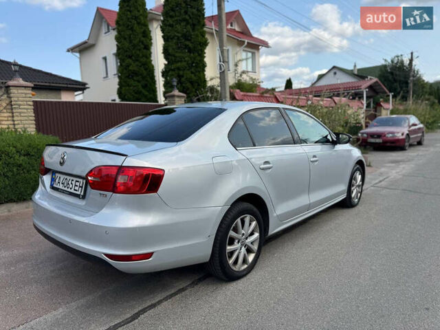 Сірий Фольксваген Джетта, об'ємом двигуна 1.39 л та пробігом 180 тис. км за 7700 $, фото 1 на Automoto.ua