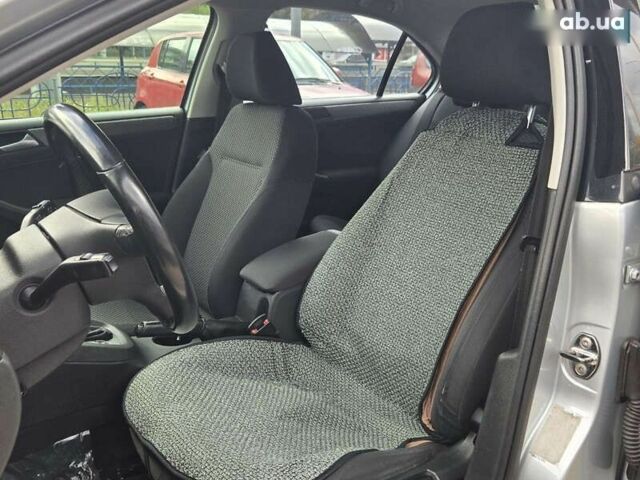 Серый Фольксваген Джетта, объемом двигателя 1.4 л и пробегом 154 тыс. км за 8800 $, фото 8 на Automoto.ua