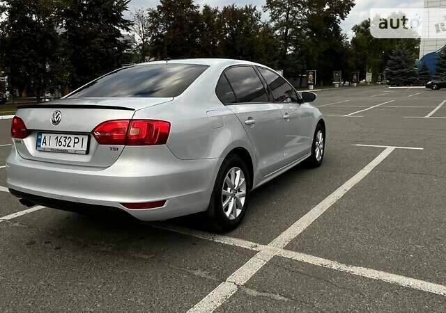 Сірий Фольксваген Джетта, об'ємом двигуна 1.4 л та пробігом 212 тис. км за 9300 $, фото 6 на Automoto.ua