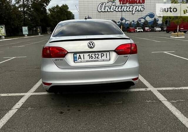 Сірий Фольксваген Джетта, об'ємом двигуна 1.4 л та пробігом 212 тис. км за 9300 $, фото 7 на Automoto.ua