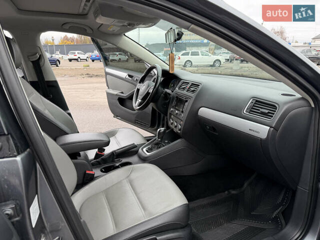 Серый Фольксваген Джетта, объемом двигателя 1.4 л и пробегом 225 тыс. км за 9200 $, фото 20 на Automoto.ua