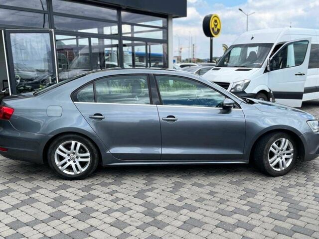 Серый Фольксваген Джетта, объемом двигателя 1.4 л и пробегом 290 тыс. км за 8990 $, фото 7 на Automoto.ua