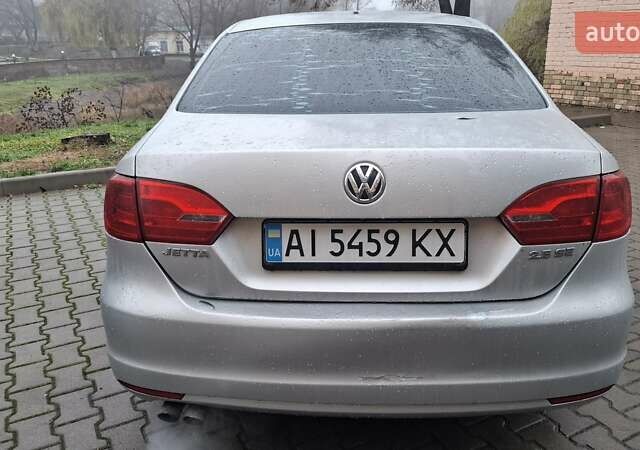 Сірий Фольксваген Джетта, об'ємом двигуна 2.5 л та пробігом 312 тис. км за 7700 $, фото 2 на Automoto.ua
