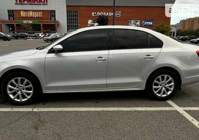 Сірий Фольксваген Джетта, об'ємом двигуна 1.4 л та пробігом 212 тис. км за 9300 $, фото 4 на Automoto.ua