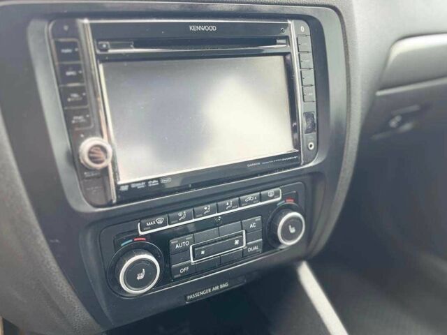 Серый Фольксваген Джетта, объемом двигателя 1.4 л и пробегом 290 тыс. км за 8990 $, фото 18 на Automoto.ua