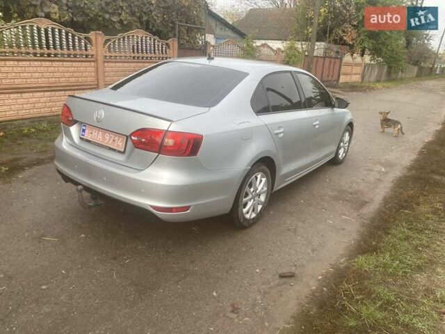 Серый Фольксваген Джетта, объемом двигателя 1.6 л и пробегом 240 тыс. км за 9500 $, фото 3 на Automoto.ua