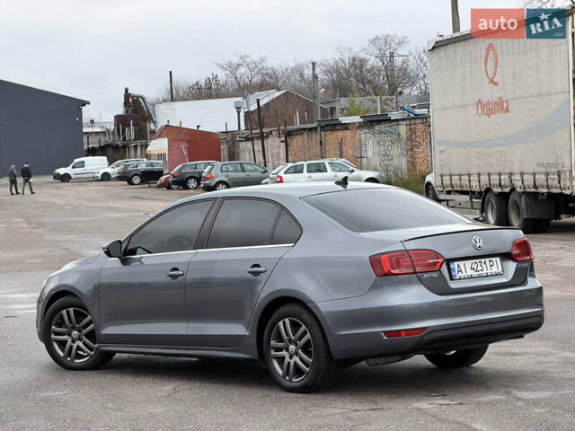 Серый Фольксваген Джетта, объемом двигателя 1.4 л и пробегом 225 тыс. км за 9200 $, фото 11 на Automoto.ua