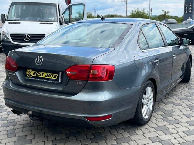 Серый Фольксваген Джетта, объемом двигателя 1.4 л и пробегом 290 тыс. км за 8990 $, фото 6 на Automoto.ua