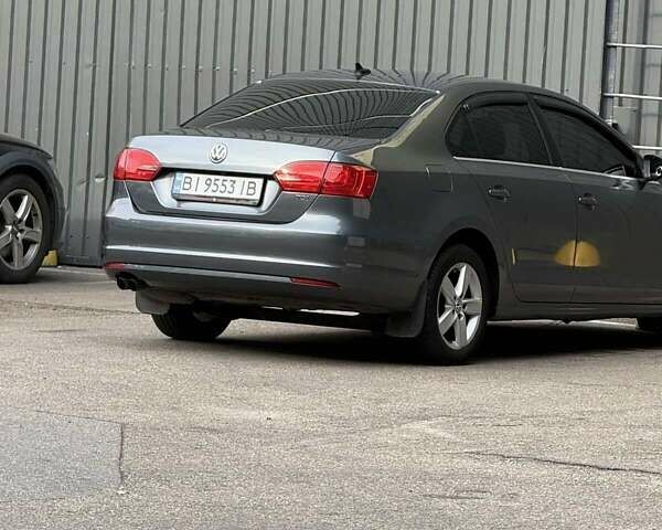 Серый Фольксваген Джетта, объемом двигателя 1.97 л и пробегом 145 тыс. км за 12000 $, фото 3 на Automoto.ua