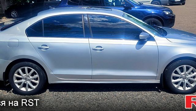 Серый Фольксваген Джетта, объемом двигателя 2.5 л и пробегом 210 тыс. км за 7700 $, фото 2 на Automoto.ua