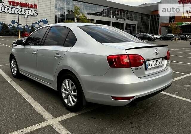 Сірий Фольксваген Джетта, об'ємом двигуна 1.4 л та пробігом 212 тис. км за 9300 $, фото 5 на Automoto.ua