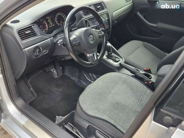 Серый Фольксваген Джетта, объемом двигателя 1.4 л и пробегом 154 тыс. км за 8800 $, фото 7 на Automoto.ua