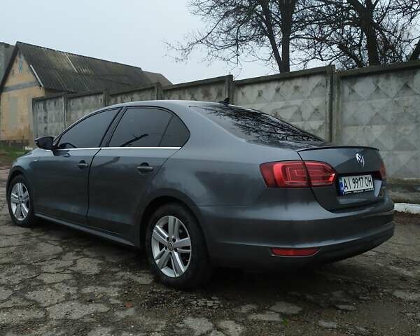 Серый Фольксваген Джетта, объемом двигателя 1.39 л и пробегом 223 тыс. км за 9900 $, фото 1 на Automoto.ua