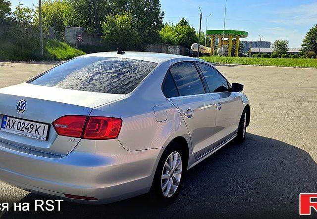 Фольксваген Джетта 2013 в Харькове на Automoto.ua Серый Фольксваген Джетта, объемом двигателя 1.8 л и пробегом 174 тыс. км за 10000 $, фото 4 на Automoto.ua