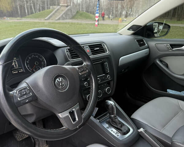 Сірий Фольксваген Джетта, об'ємом двигуна 1.39 л та пробігом 178 тис. км за 10000 $, фото 7 на Automoto.ua